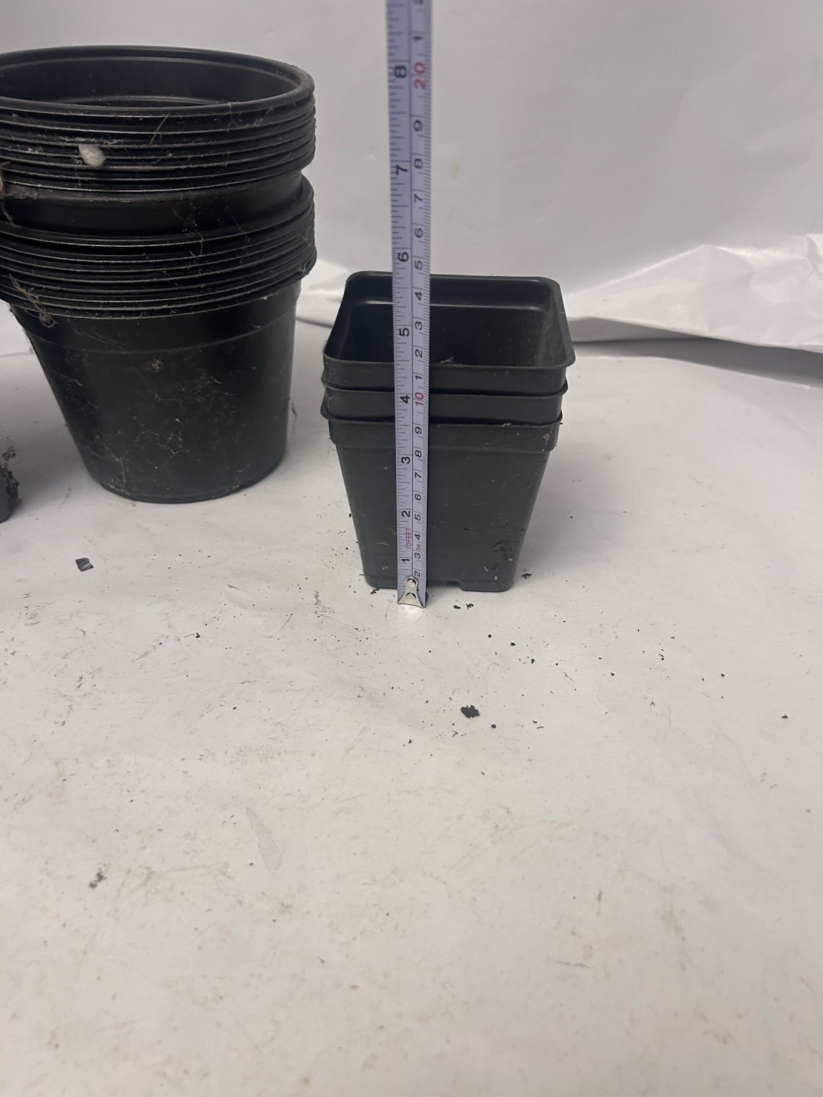 lot of plastic various size/shape potting plants